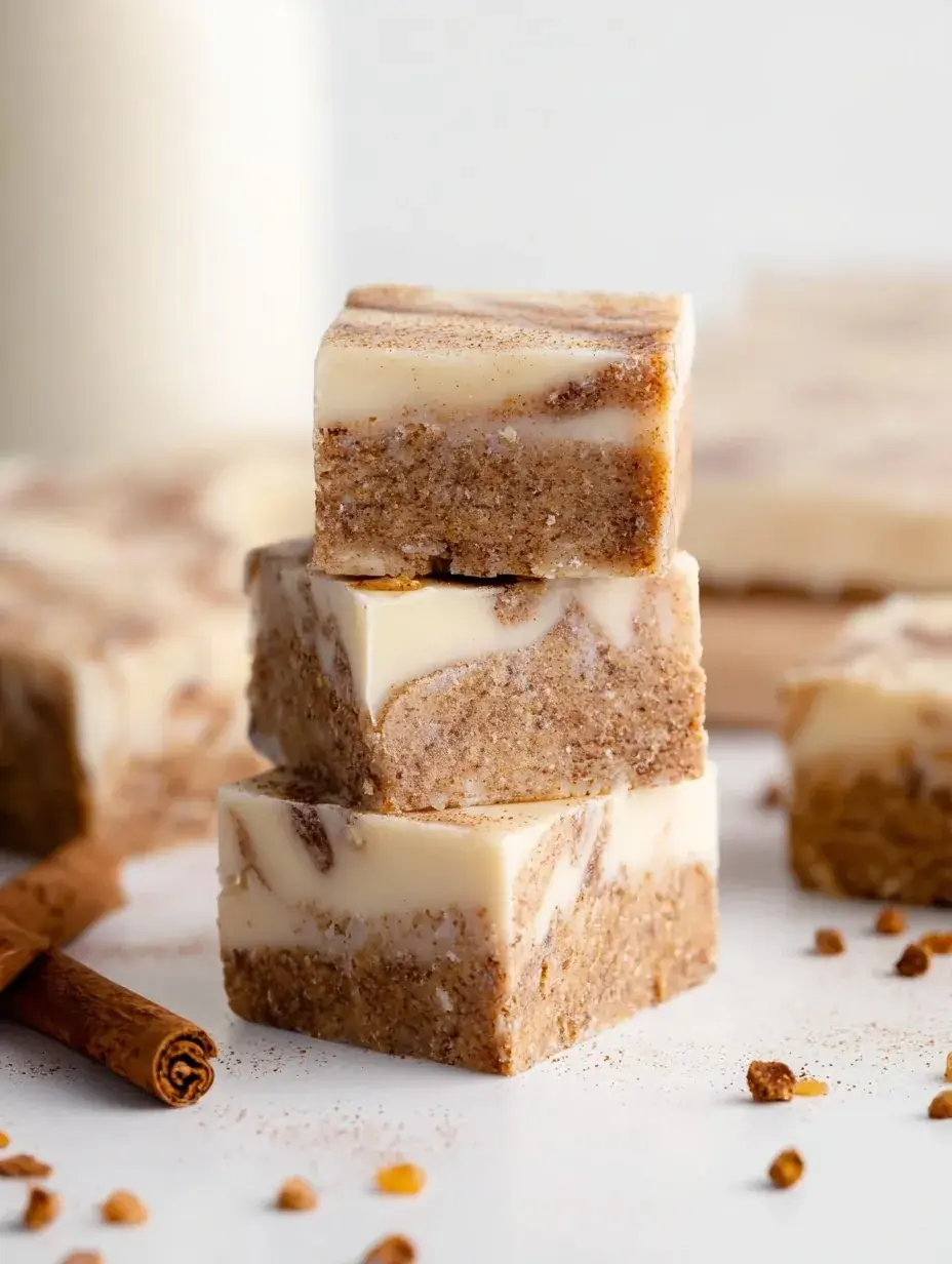 A tray of sliced Cinnamon Roll Fudge with beautiful brown sugar and cinnamon swirls