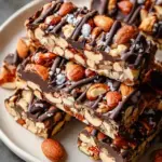 A close up view of Dark Chocolate and Sea Salt Nut Bars showing the drizzled chocolate and flaky salt