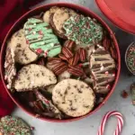 A row of sliced round Gluten-Free Slice and Bake Cookies on a baking sheet before going into the oven.