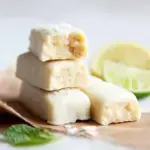 A tray of freshly sliced Lemon Collagen Protein Bars showing their soft, fudgy texture
