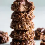 Healthy no-bake chocolate peanut butter cookies on a parchment lined tray