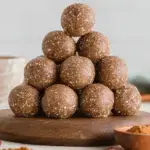 A tray of round Pecan Pie Bliss Balls made with dates and pecans