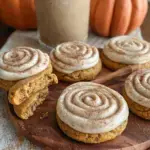A tray of Soft Pumpkin Cookies with Cinnamon Frosting on a cooling rack