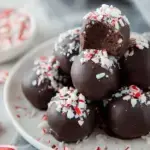 A tray of Vegan Gluten-Free Peppermint Brownie Truffles topped with crushed candy canes
