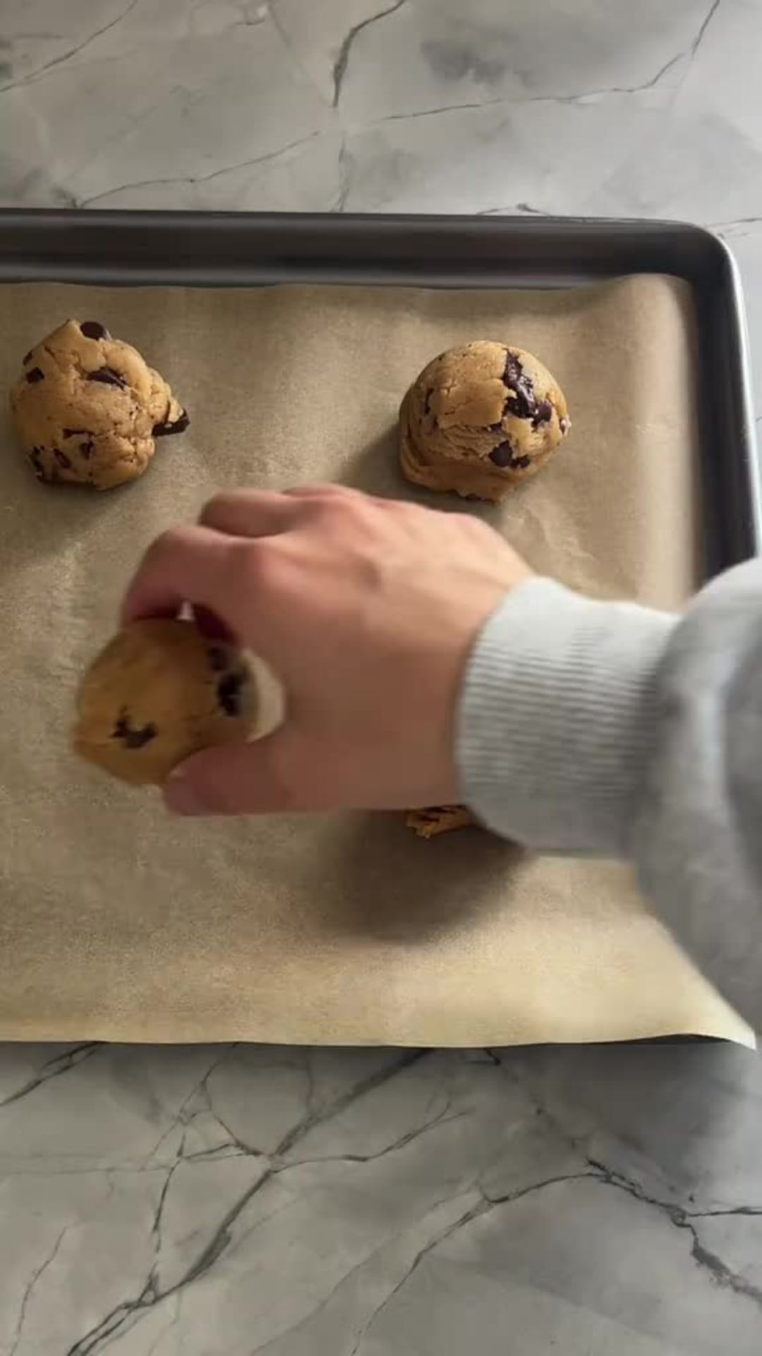 Chewy Brown Butter Chocolate Chunk Cookies - Scooping cookie dough onto baking tray