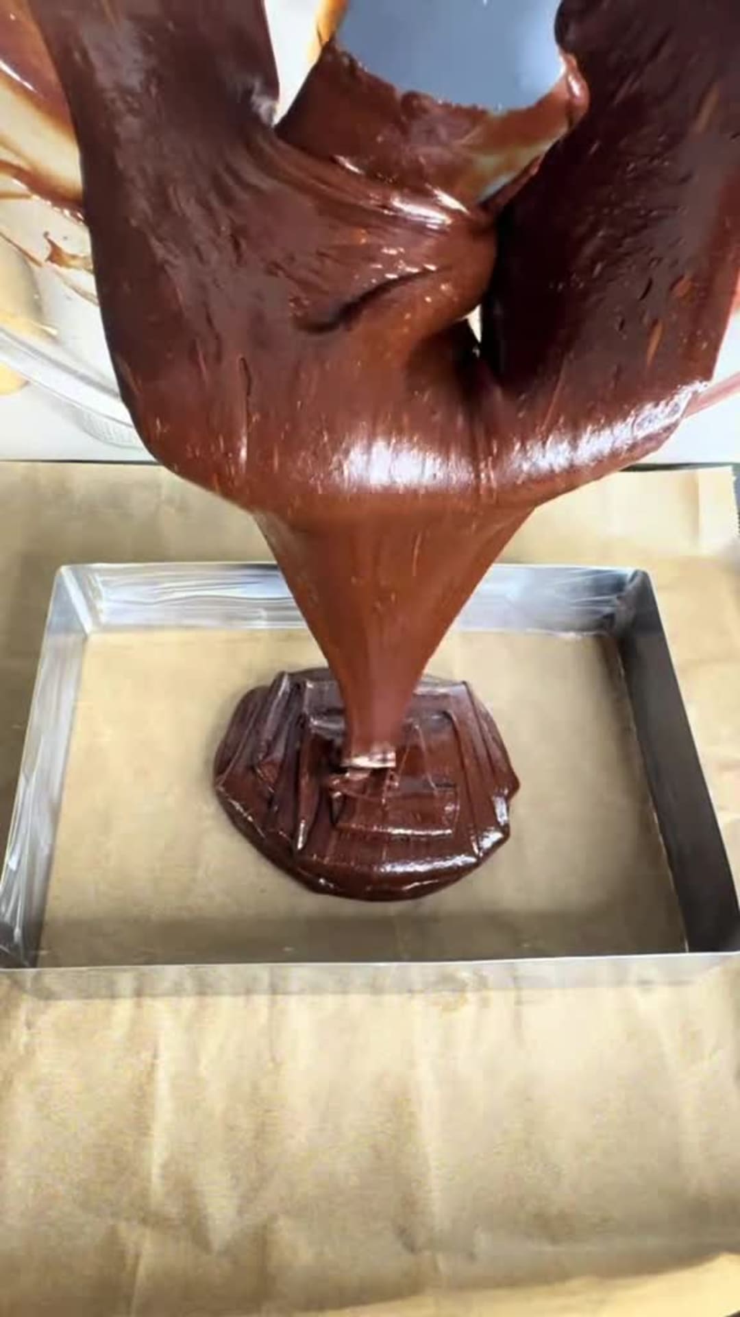 Fudgy Chocolate Strawberry Nutella Brownies - Pouring brownie batter into baking pan