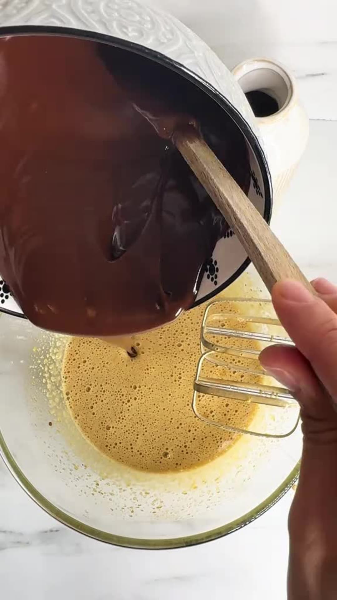 Fudgy Salted Caramel Pecan Brownies - Mixing chocolate into whipped eggs