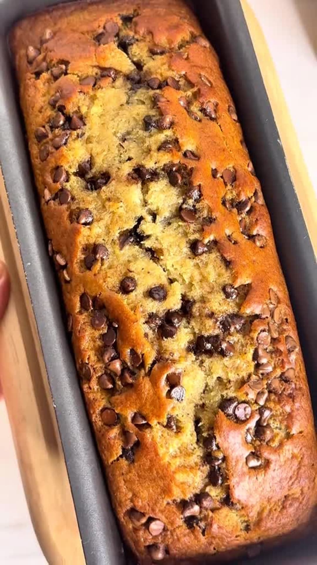 Moist Chocolate Chip Banana Bread - Freshly baked loaf sliced open