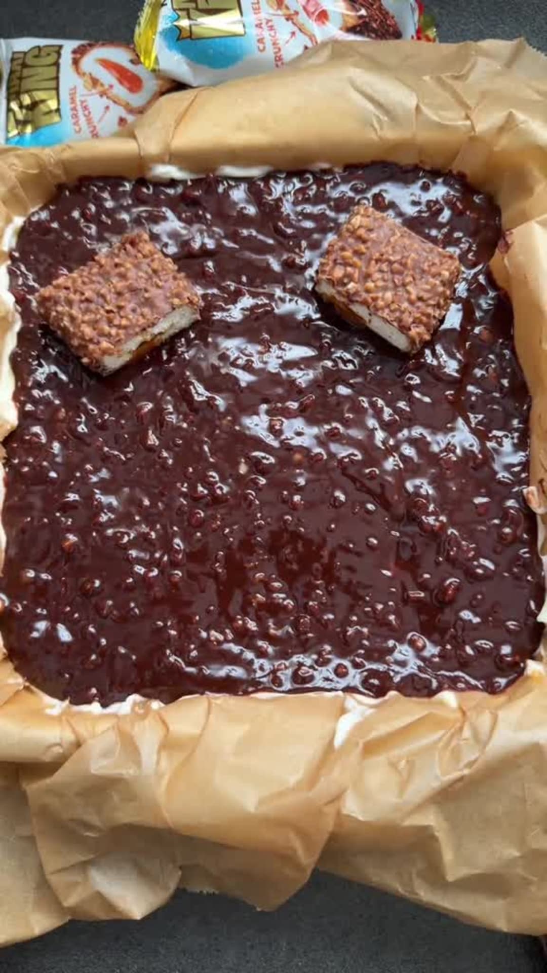 No-Bake Kinder Max King Cake - Decorating top with snack bars